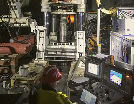 The card image for the Granny Smith project page shows a Redbore 90 raisebore drill operating in an underground mine.